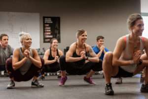 fitness class doing squats